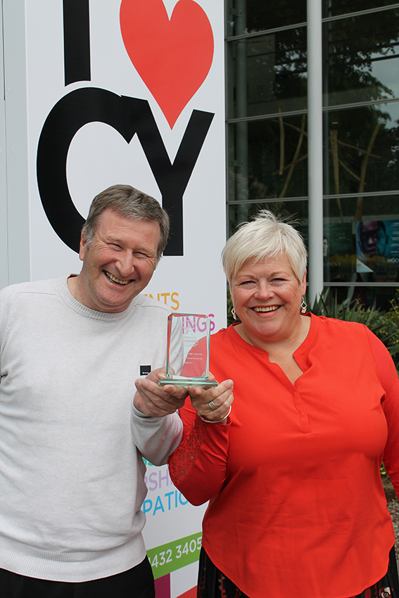 Ian Archer and Melanie Denning celebrate their award