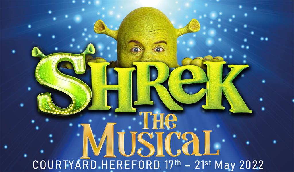 Shrek The Musical title image with a green ogre head popping up over the words