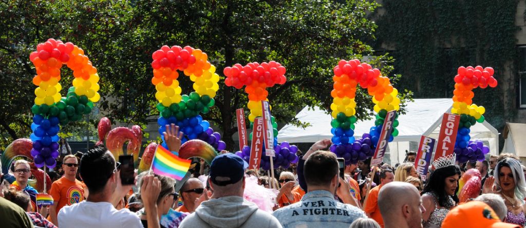 The word Pride modelled out of Rainbow Balloons