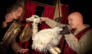 Pedlars Tales two people with a big white bird puppet