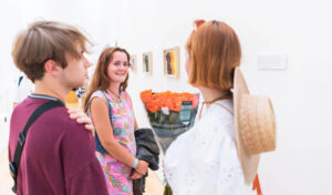 Cultivate@Courtyard Private View 2021 - Three people chatting about cultivate exhibition
