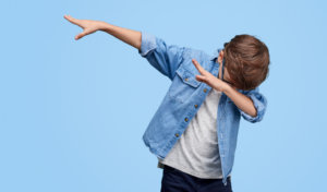 Young boy with one arm out and his head in the crook of his elbow on the other arm