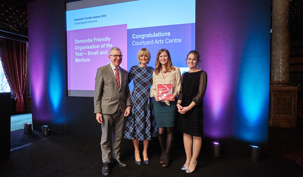 100 new dementia friends - Dementia Champions collecting The Courtyard's Dementia Friendly Organisation of the Year award in 2019