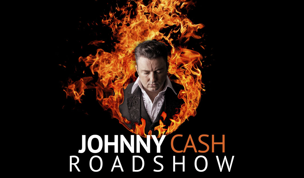 Johnny Cash Roadshow title image - man looking down surrounded by a ring of fire