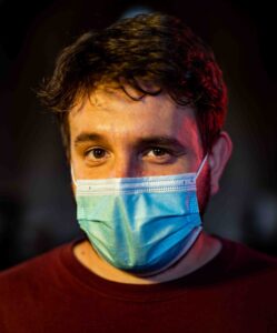 Jonathan Zaurin wearing a blue face mask
