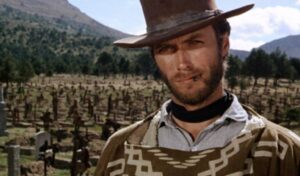 A Fistful of Dollars, Image - Clint Eastwood stands in a poncho and cowboy hat