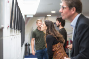 Images - A group of people looking at artwork on The Courtyard Gallery