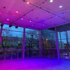 Image - The Nell Gwynne Studio lit up in pink and purple lights