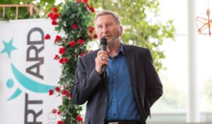 A close up of Ian Archer giving a speech