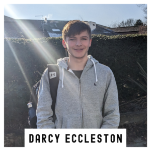 A young artist named Darcy Eccleston standing outside The Courtyard.