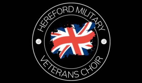 A union jack flag surrounded by a circle of text that reads Hereford military veterans choir