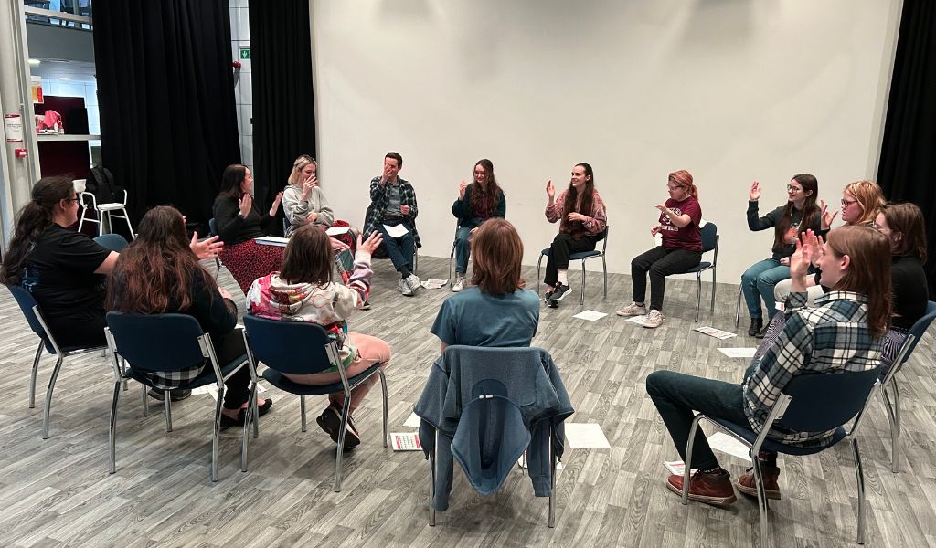 Senior Youth Theatre taking part in a sign workshop