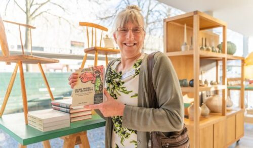 Clare  holding her book