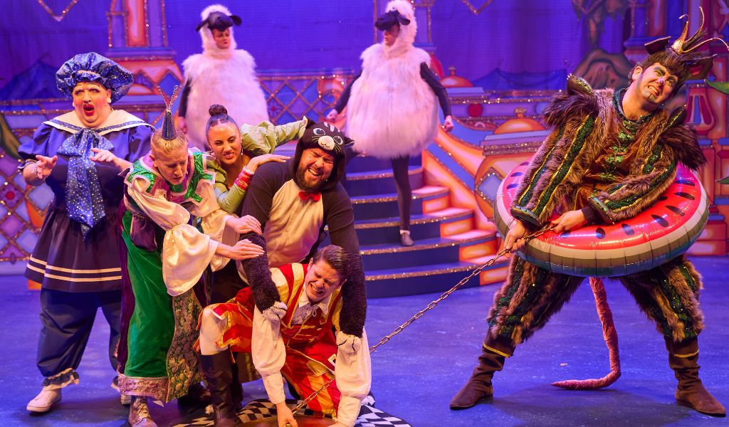A production shot of the Dick Whittington cast on stage