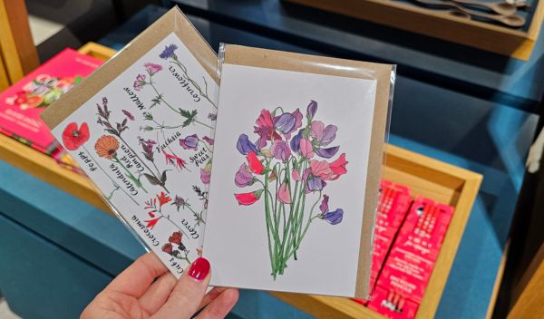 Two hand made cards with with flowers on