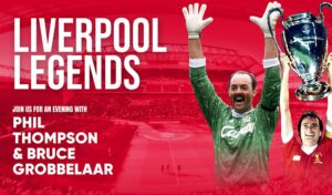 An image of a football stadium. There are two cut outs of footballers with their arms in the air, one holds a trophy. Writing reads 'Liverpool Legends join us for an evening with Phil Thompson & Bruce Grobbelaar'