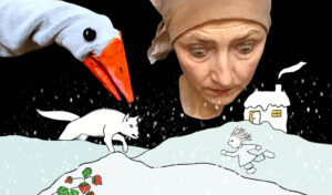 A woman and a sock puppet of a goose look down at an animated scene of a girl running across snow towards a fox.