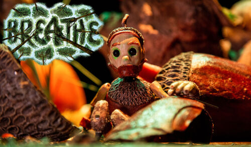 Breathe  an acorn puppet sits by some acorns  the title Breathe has illustrated trees around it