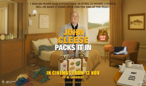 John Cleese an elderly man in a beige suit stands in front of an illustrated hotel room whilst holding a suitcase