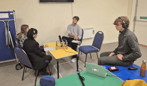 A photo of the Youth Board recording a podcast