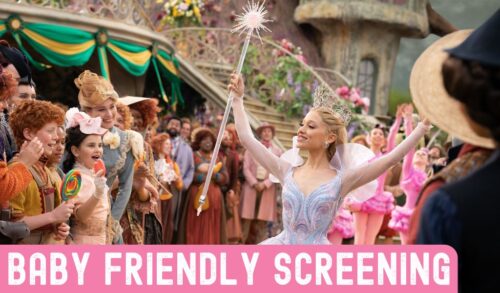 A woman in a sparkly dress stands holding a wand with her arms outstretched Around her are crowds of people celebrating In the bottom left the text reads Baby Friendly Screening