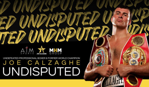 A man holding two wrestling champion belts on his shoulders The text next to him reads Undefeated Professional Boxer  Former World Champion  Joe Zalzaghe Undisputed