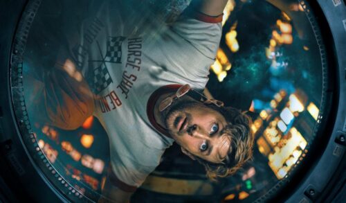 Ryan Gosling in a spaceship is floating upsidedown