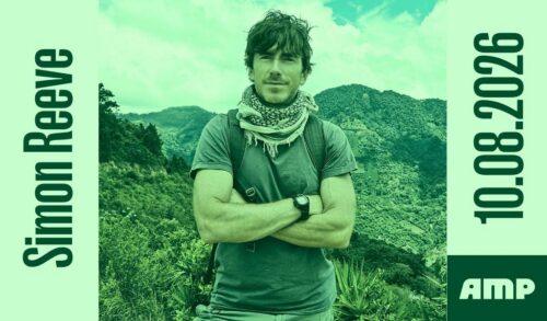 A man with short brown hair wearing a grey tshirt and a scarf folding his arms in front of a range of mountains The text around him reads Simon Reeve 10082026